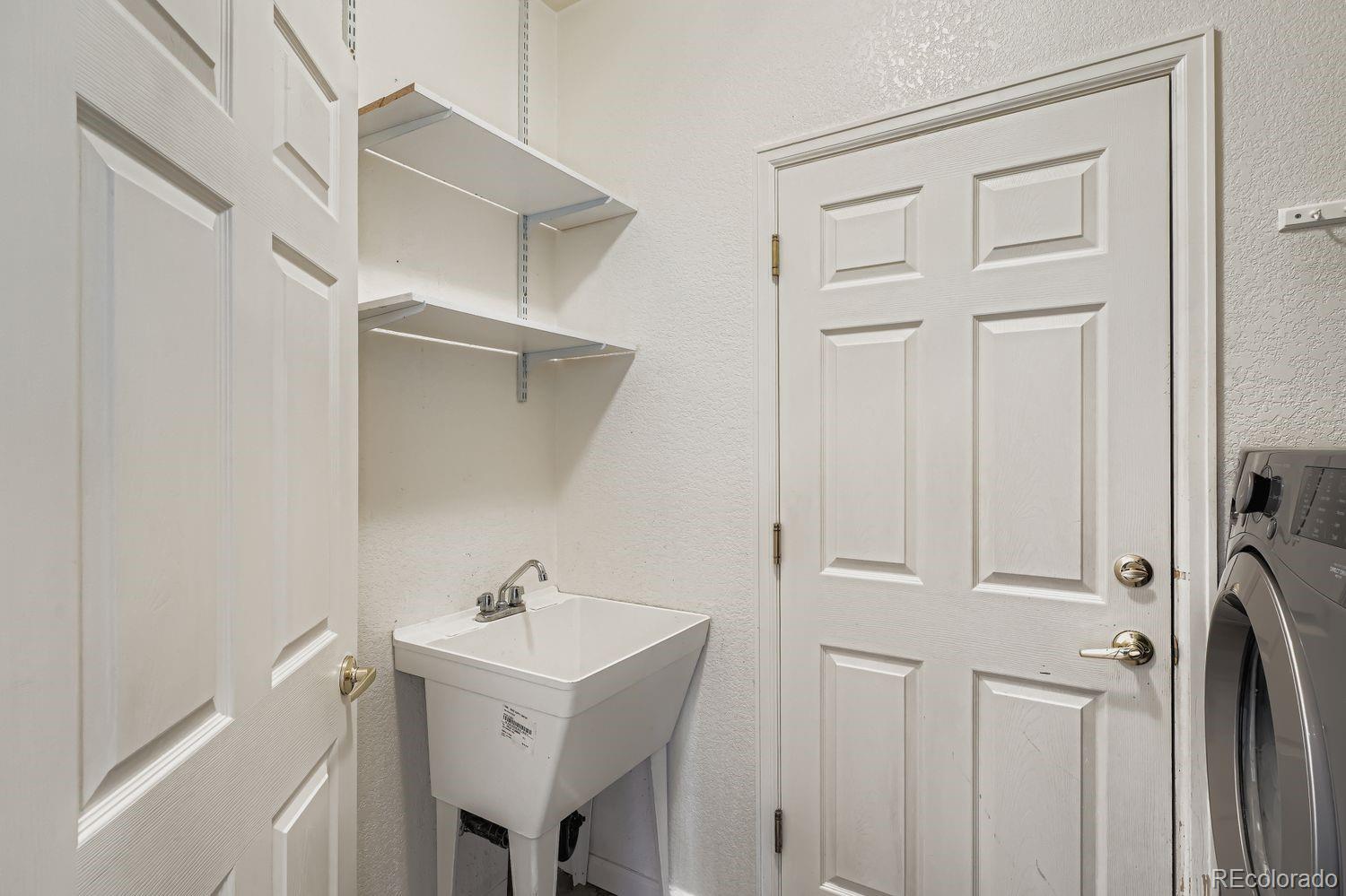 13637 Wamblee Trail Conifer, CO 80433 - Photo 24 of 30 a bathroom with a sink a toilet and shower