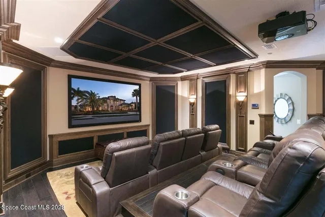 a bathroom with a granite countertop toilet a sink and a mirror