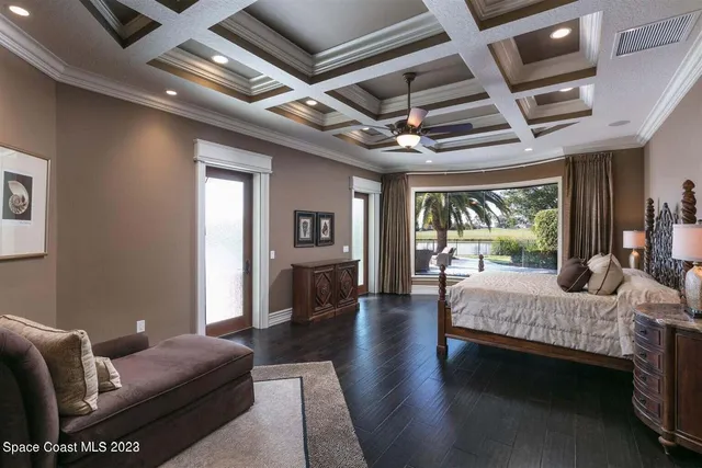 a bedroom with a bed and a table