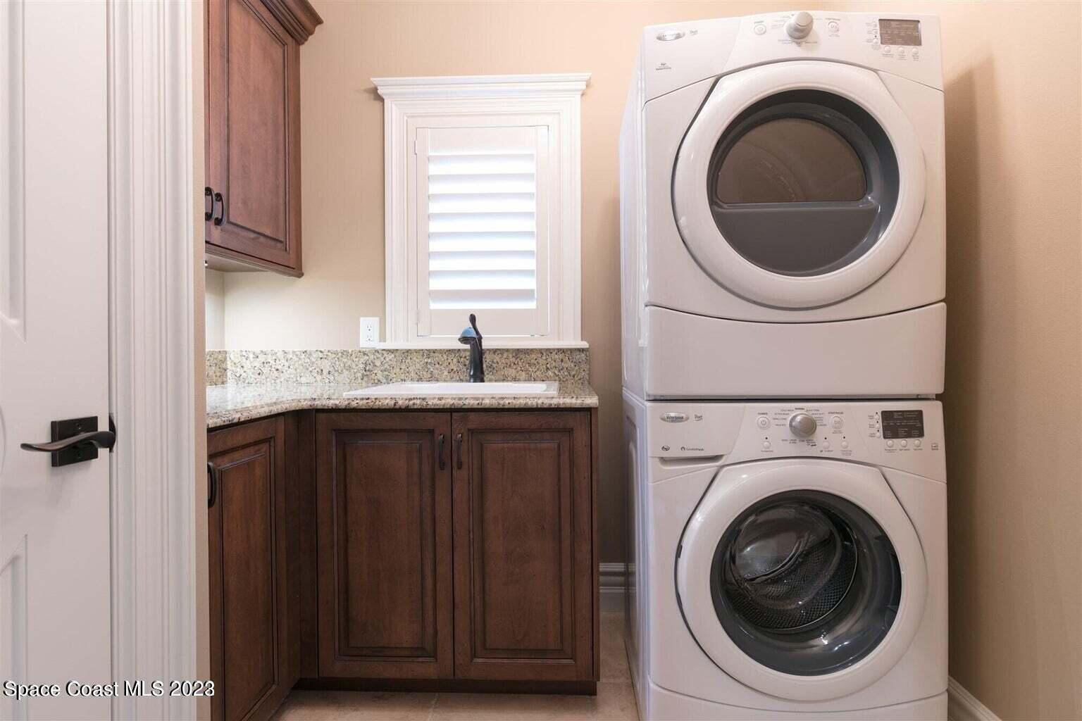 3059 Wyndham Way Melbourne, FL 32940 - Photo 38 of 60 Laundry Two