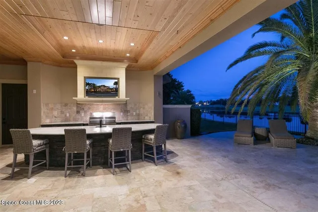 a view of a lake with houses in the back