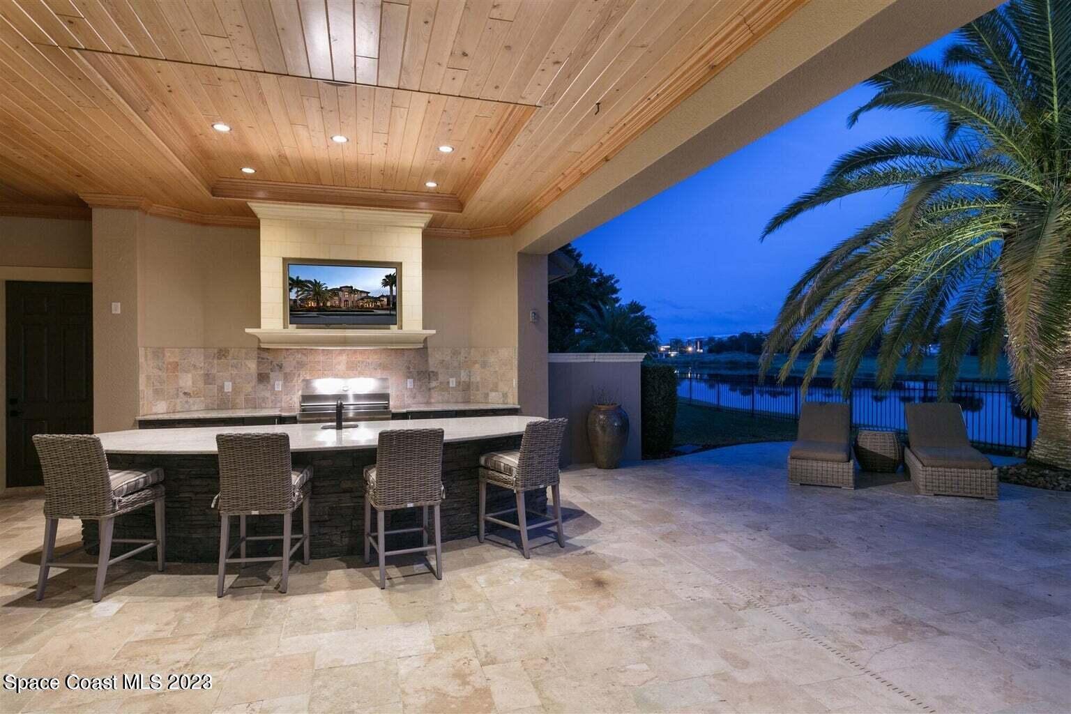 3059 Wyndham Way Melbourne, FL 32940 - Photo 47 of 60 Summer Kitchen - Entertainment Area 2