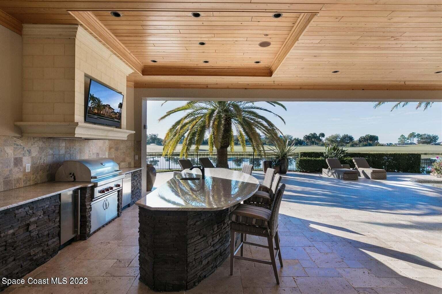 3059 Wyndham Way Melbourne, FL 32940 - Photo 48 of 60 Summer Kitchen - Entertainment Area