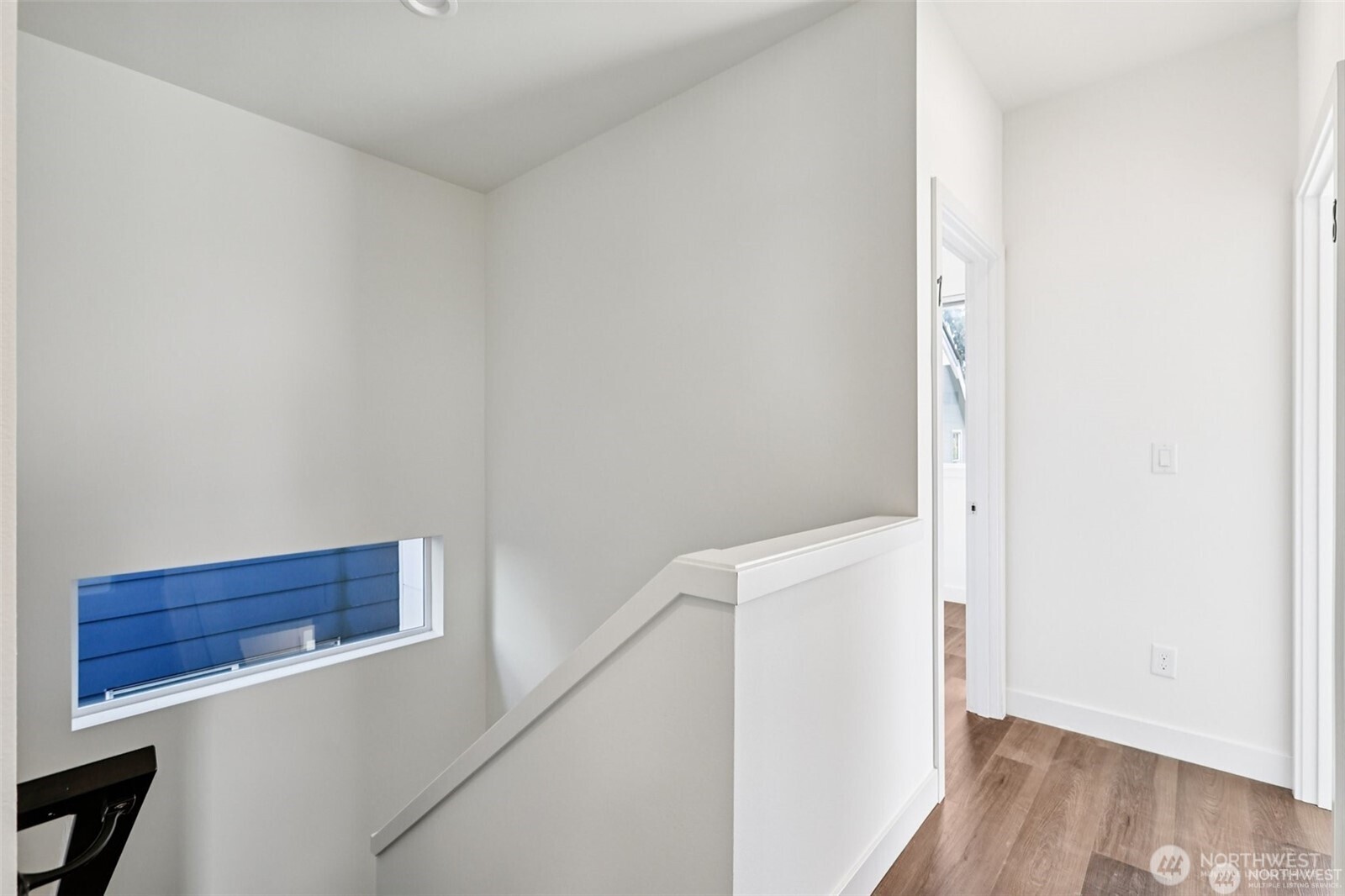 5259 Brooklyn Avenue Northeast Seattle, WA 98105 - Photo 25 of 40 a view of hallway with wooden floor