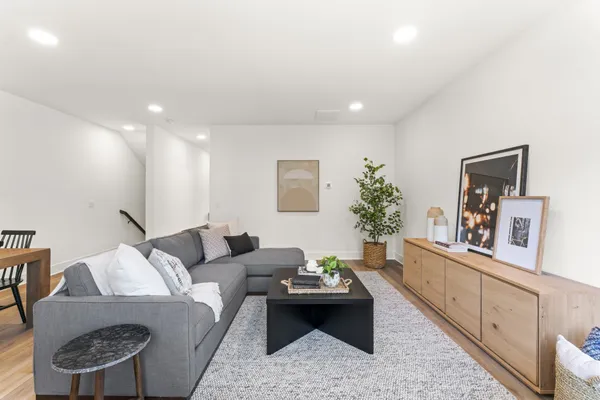 a living room with furniture and a couch