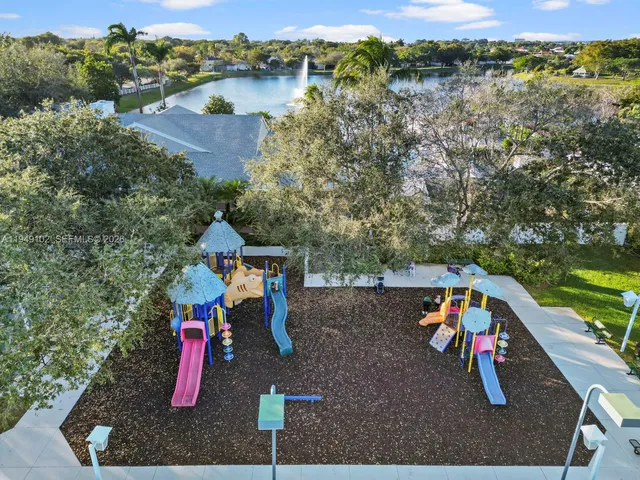 an aerial view of a house with outdoor space