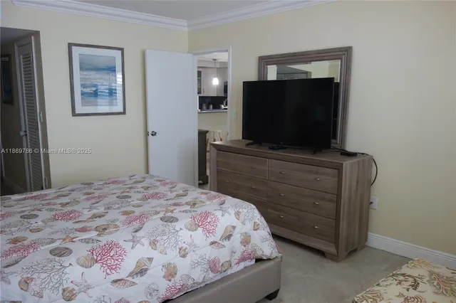 a living room with lots of furniture and a table