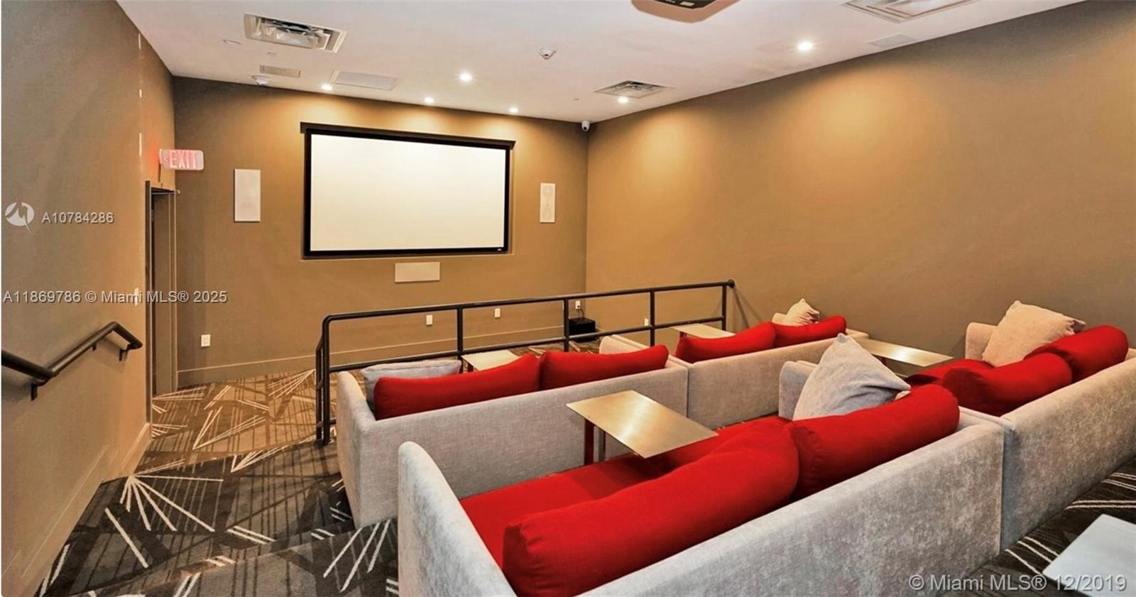 5701 Collins Avenue, Unit 1510 Miami Beach, FL 33140 - Photo 39 of 67 a living room with furniture