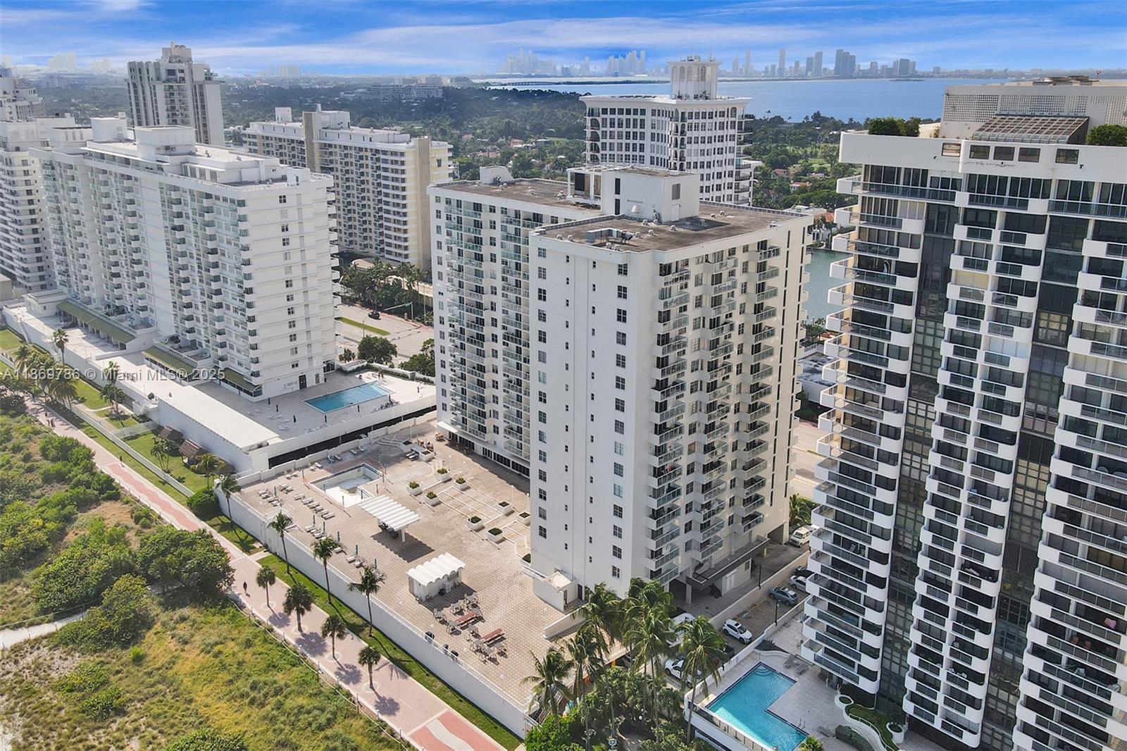 5701 Collins Avenue, Unit 1510 Miami Beach, FL 33140 - Photo 56 of 67 a view of a city with tall buildings