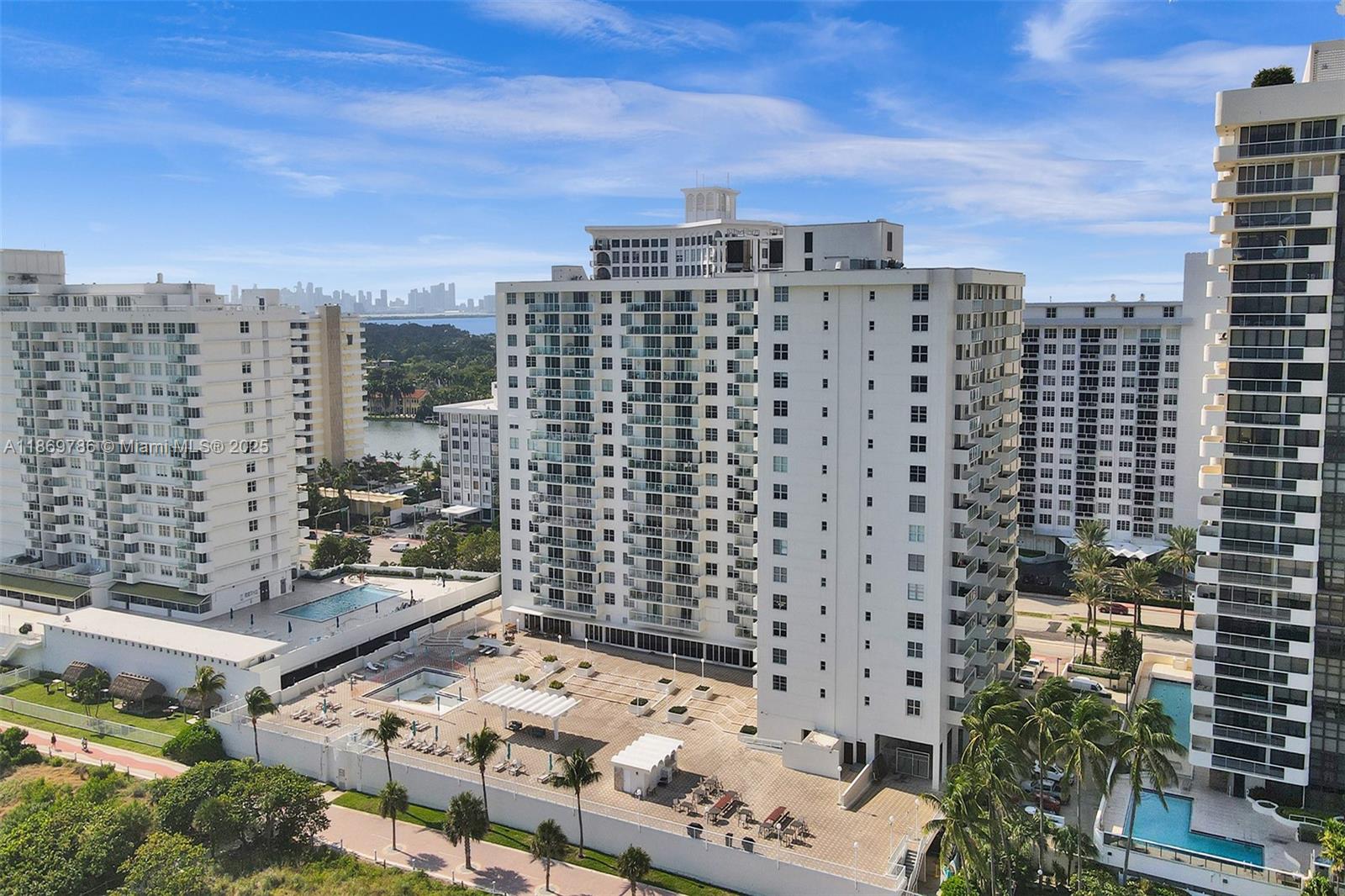 5701 Collins Avenue, Unit 1510 Miami Beach, FL 33140 - Photo 57 of 67 a view of a city with tall buildings