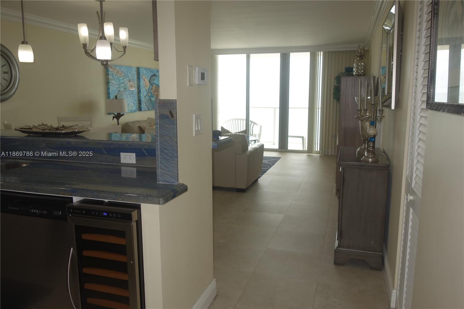 5701 Collins Avenue, Unit 1510 Miami Beach, FL 33140 - Photo 8 of 67 a bathroom with a sink and a mirror