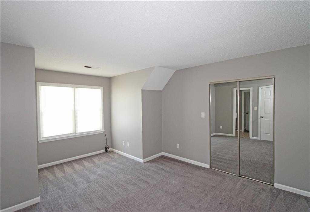957 Oak Street Southwest Atlanta, GA 30310 - Photo 12 of 17 an empty room with windows