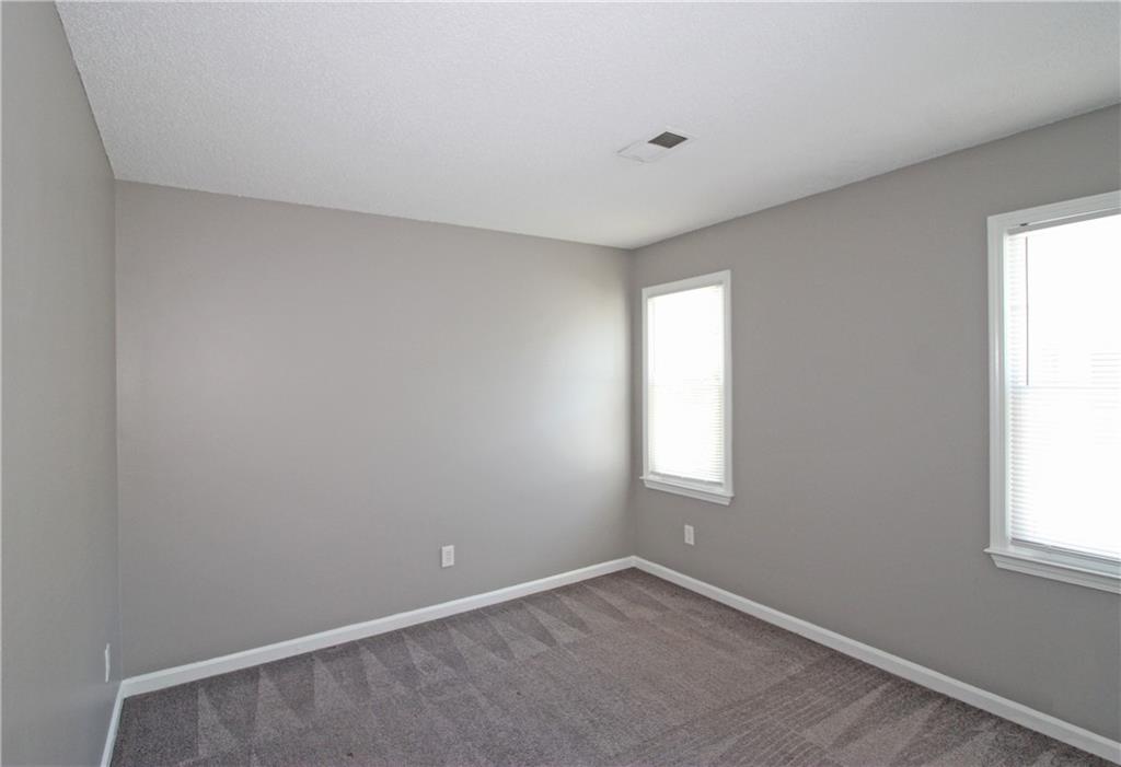 957 Oak Street Southwest Atlanta, GA 30310 - Photo 14 of 17 an empty room with windows