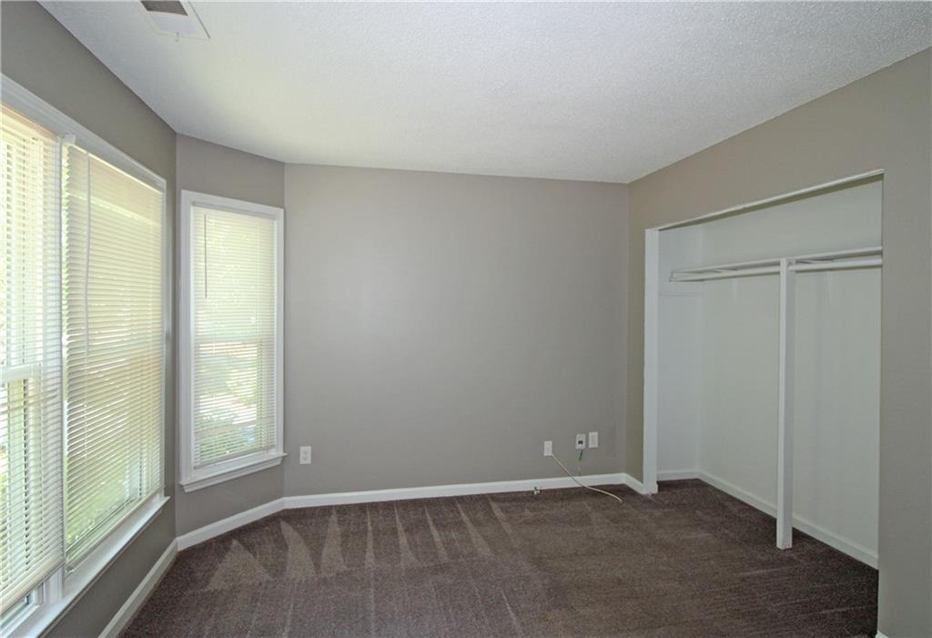 957 Oak Street Southwest Atlanta, GA 30310 - Photo 9 of 17 an empty room with windows