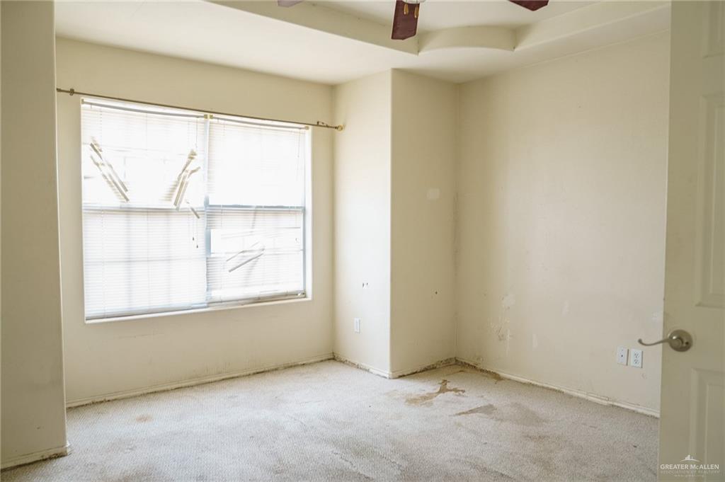 413 31st Street Hidalgo, TX 78557 - Photo 6 of 13 an empty room with a window