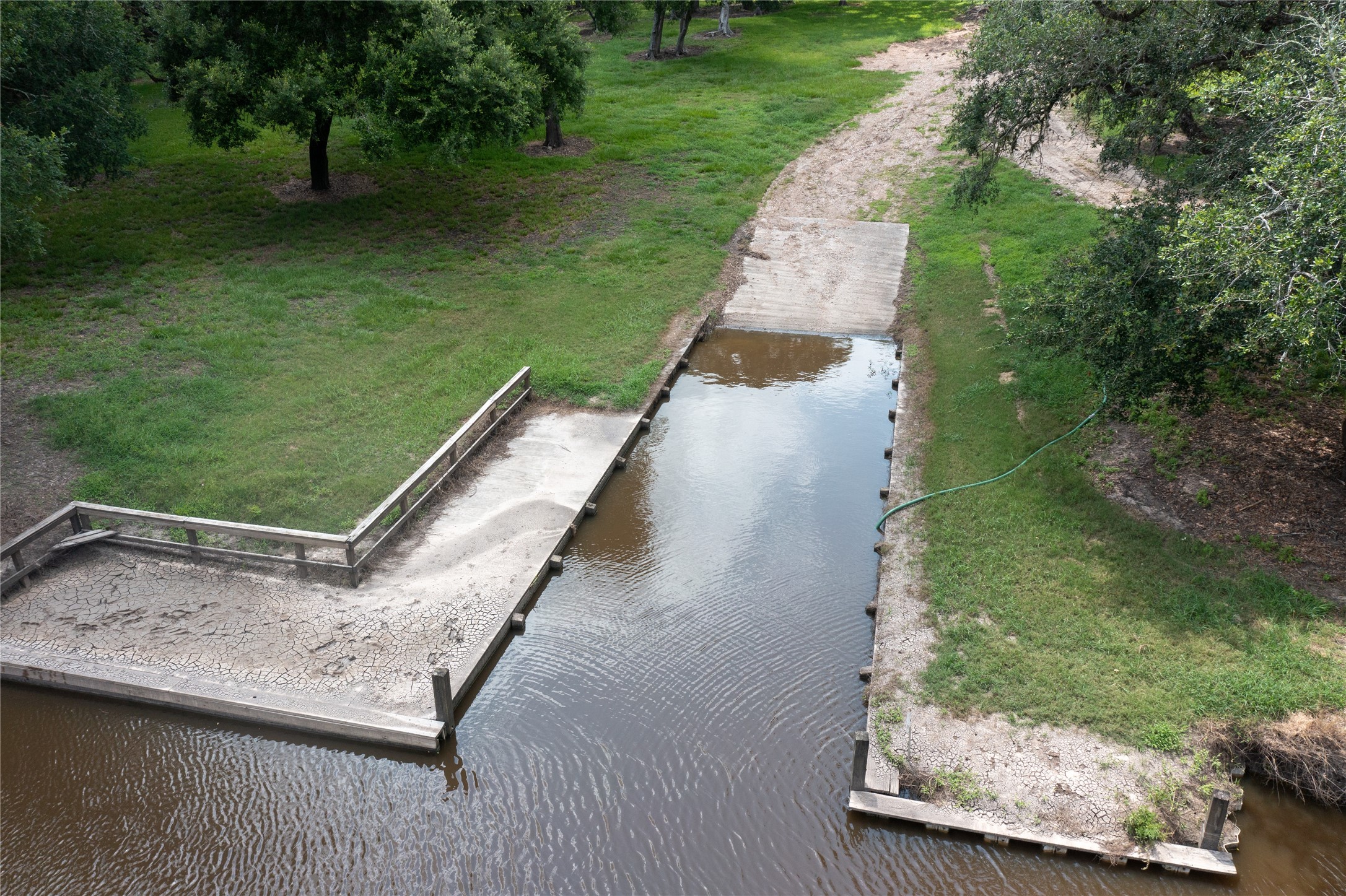 45 Center Tree Drive Palacios, TX 77465 - Photo 11 of 13 a view of a backyard with a garden