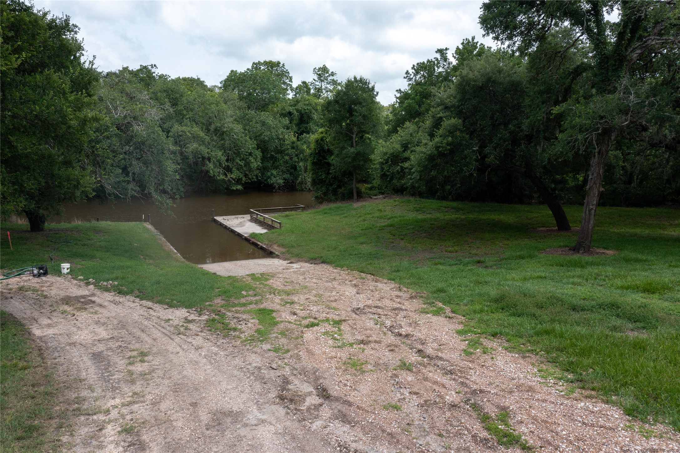 45 Center Tree Drive Palacios, TX 77465 - Photo 12 of 13 a backyard of a house with lots of green space