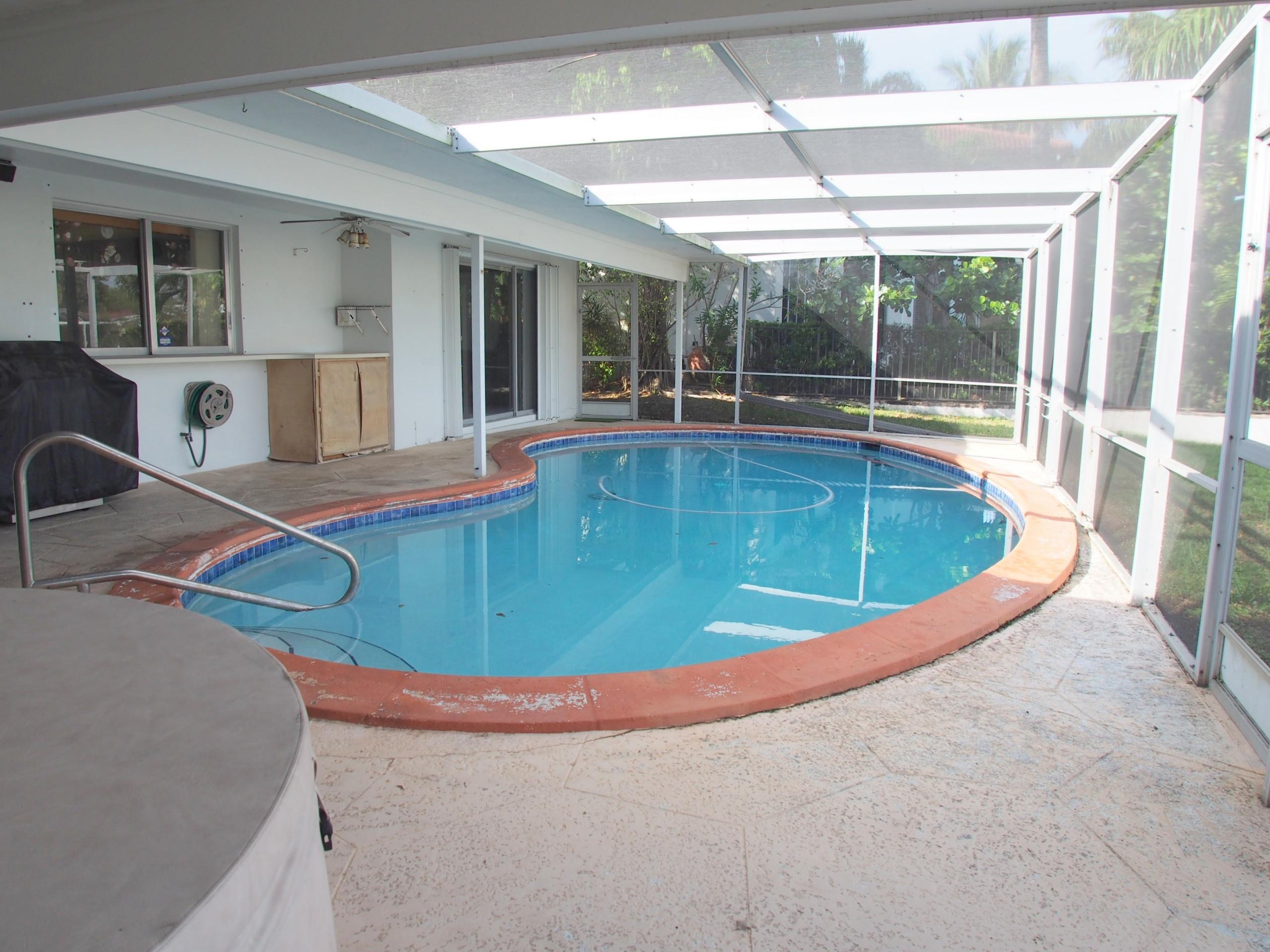 761 Northeast 69th Street Boca Raton, FL 33487 - Photo 34 of 44 Pool and Screened In Patio