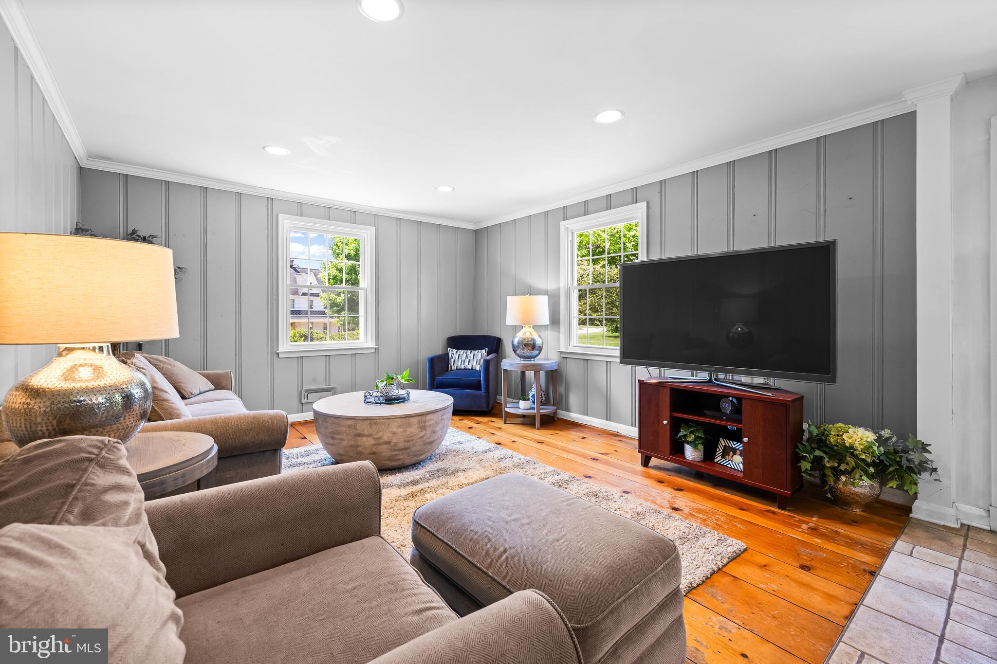 2430 Stanwick Road Phoenix, MD 21131 - Photo 25 of 51 a living room with furniture and a flat screen tv