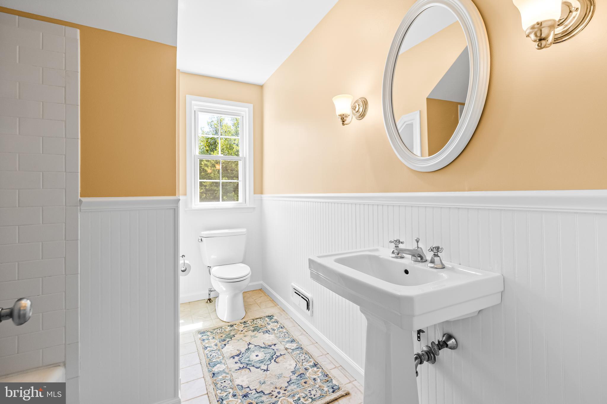 2430 Stanwick Road Phoenix, MD 21131 - Photo 44 of 51 a bathroom with a sink a toilet and a mirror