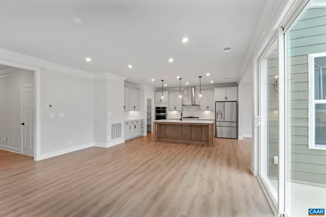 a view of kitchen with wooden floor