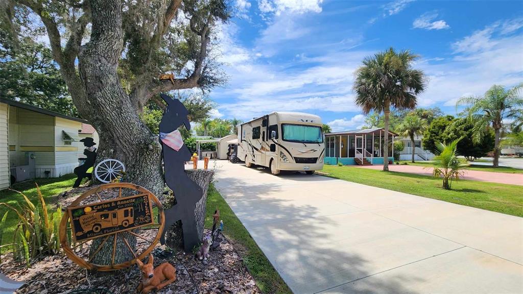 72 Roan Road River Ranch, FL 33867 - Photo 1 of 1 a view of a park with swings and slides