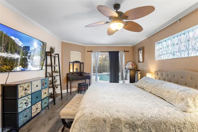 a view of walk in closet with clothes