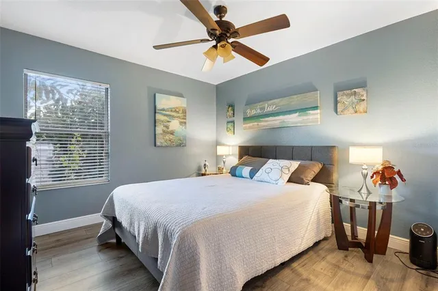 a kitchen with a refrigerator and a sink