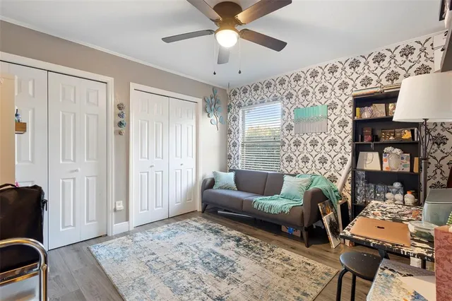 a room with furniture and a flat screen tv