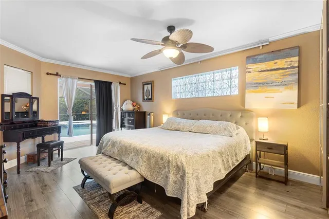 a view of a livingroom with furniture and a window