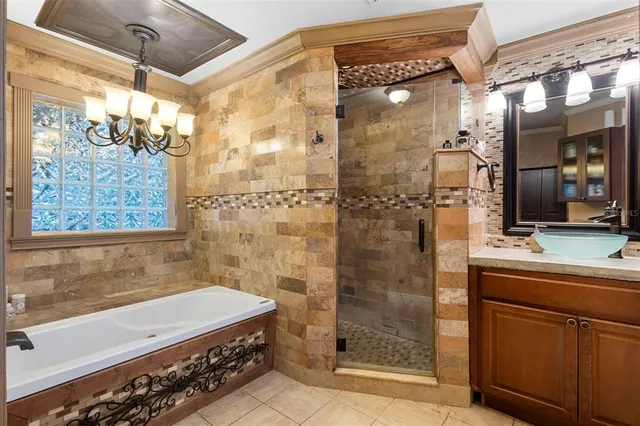 a kitchen with counter top space appliances and cabinets