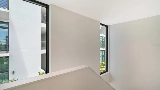 a view of parking garage with parked cars