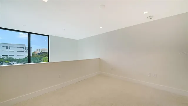 a aerial view of a house with a yard