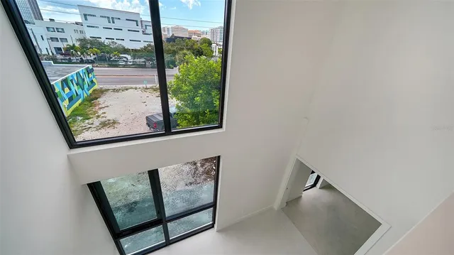 a view of a street with sitting area