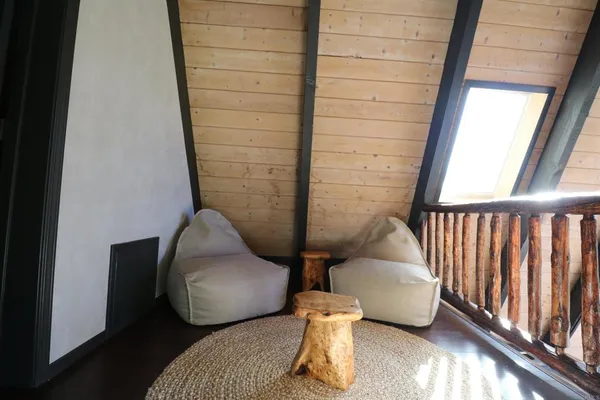 a view of swimming pool with furniture