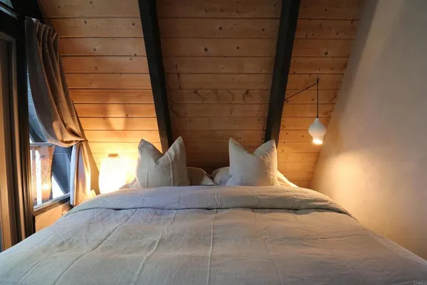 a view of a balcony with chairs