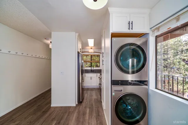 a view of a storage & utility room with wooden floor