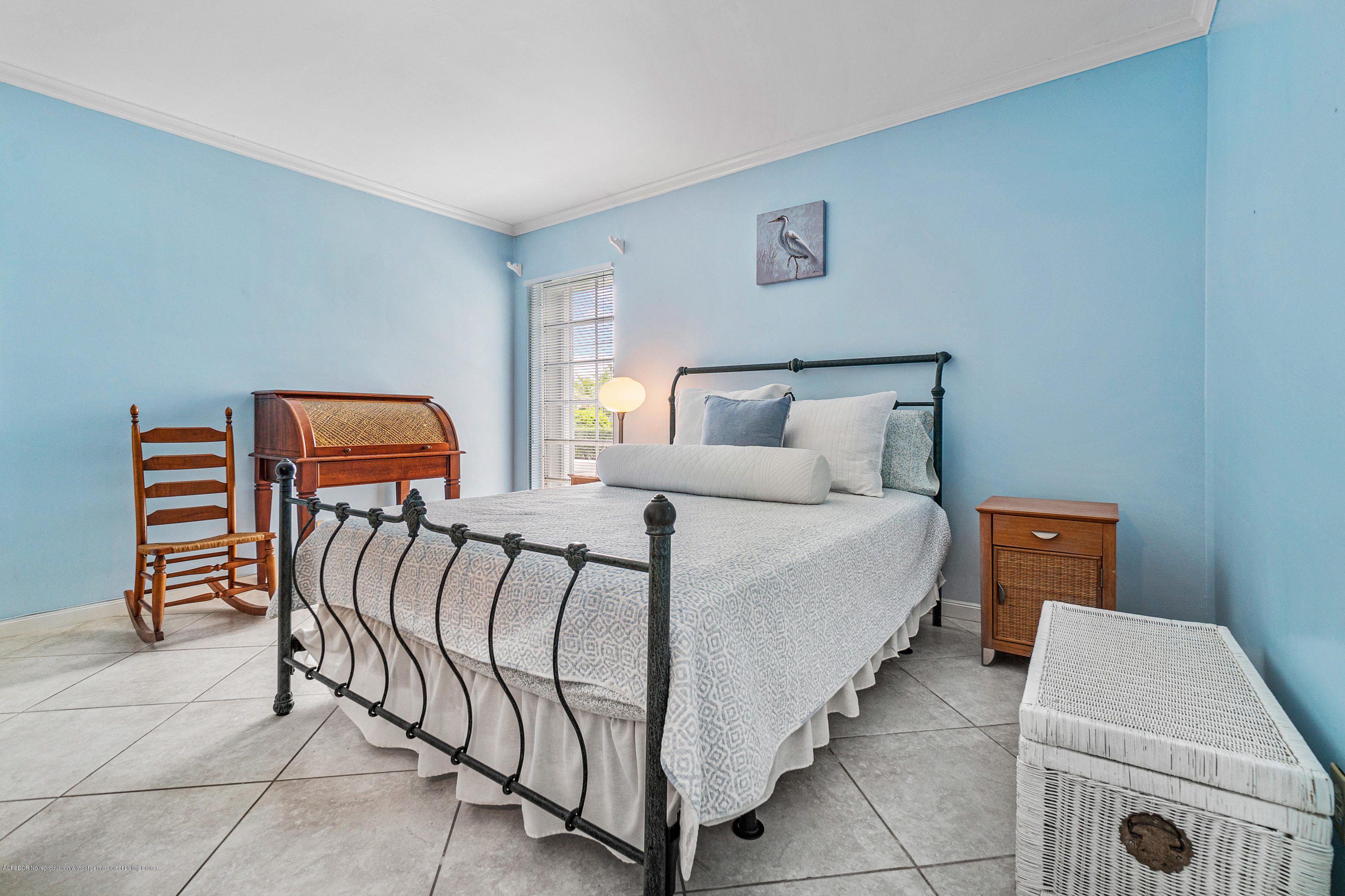 2185 Ibis Isle Road, Unit 40 Palm Beach, FL 33480 - Photo 20 of 28 a bedroom with bed and window
