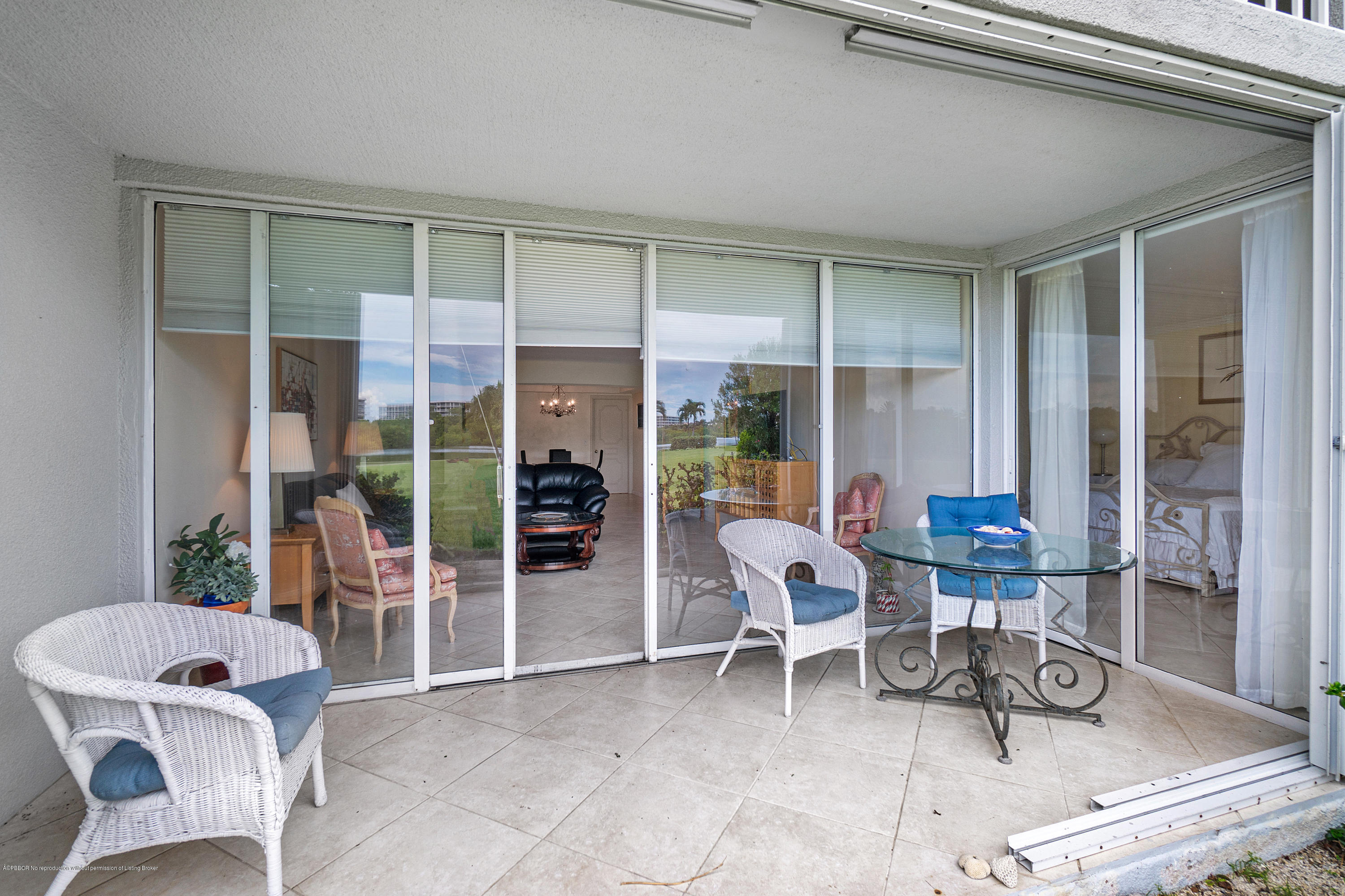 2185 Ibis Isle Road, Unit 40 Palm Beach, FL 33480 - Photo 9 of 28 a outdoor living space with furniture