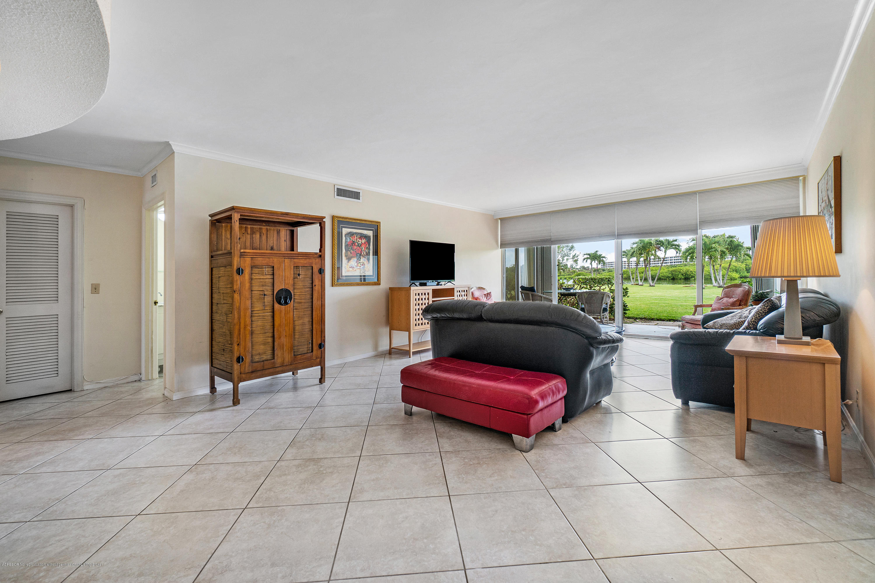 2185 Ibis Isle Road, Unit 40 Palm Beach, FL 33480 - Photo 10 of 28 a living room with furniture and a window