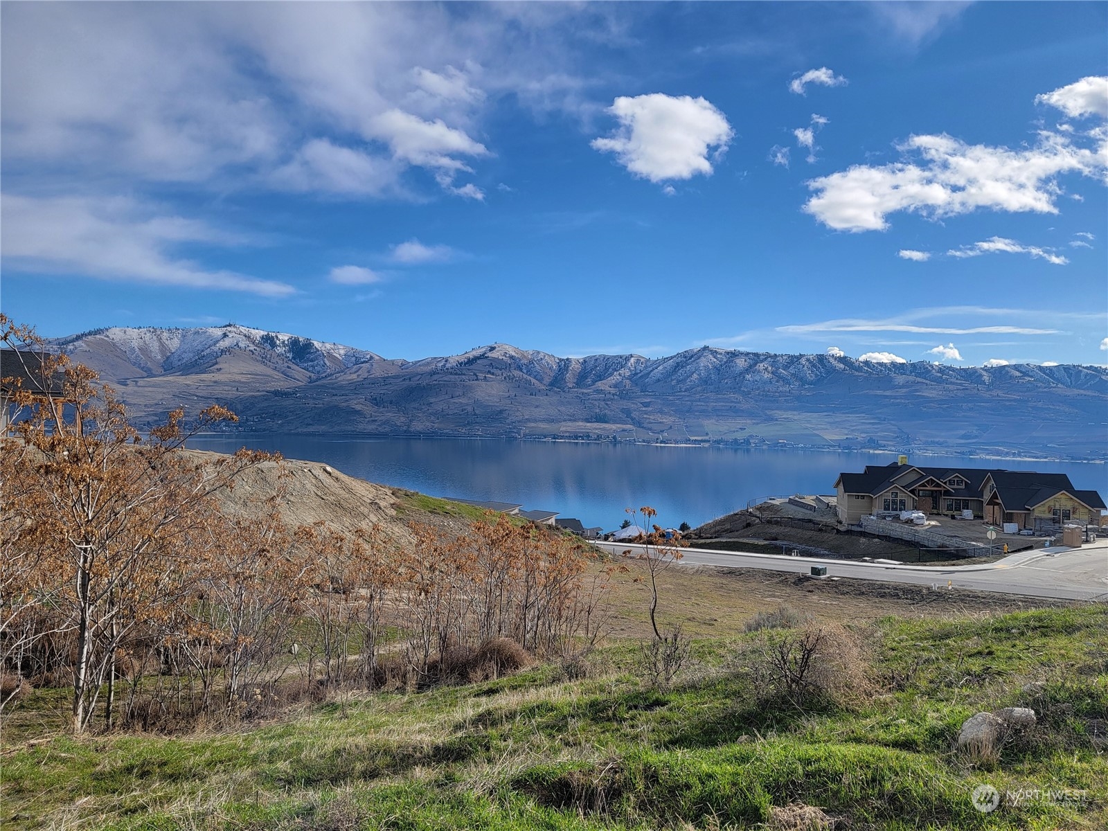 183 Easton Way Chelan, WA 98816 - Photo 2 of 3 a view of a house with a mountain