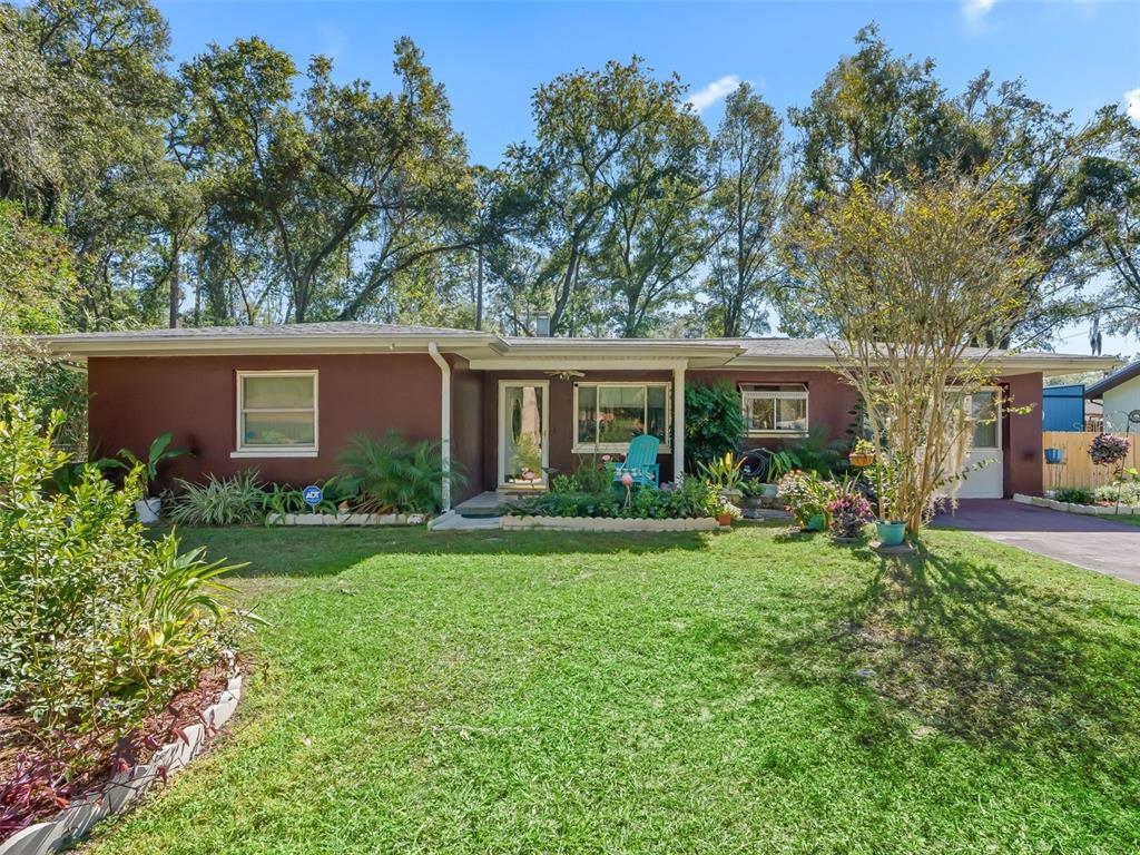 6046 East Loring Lane Inverness, FL 34452 - Photo 3 of 46 front view of a house with a yard