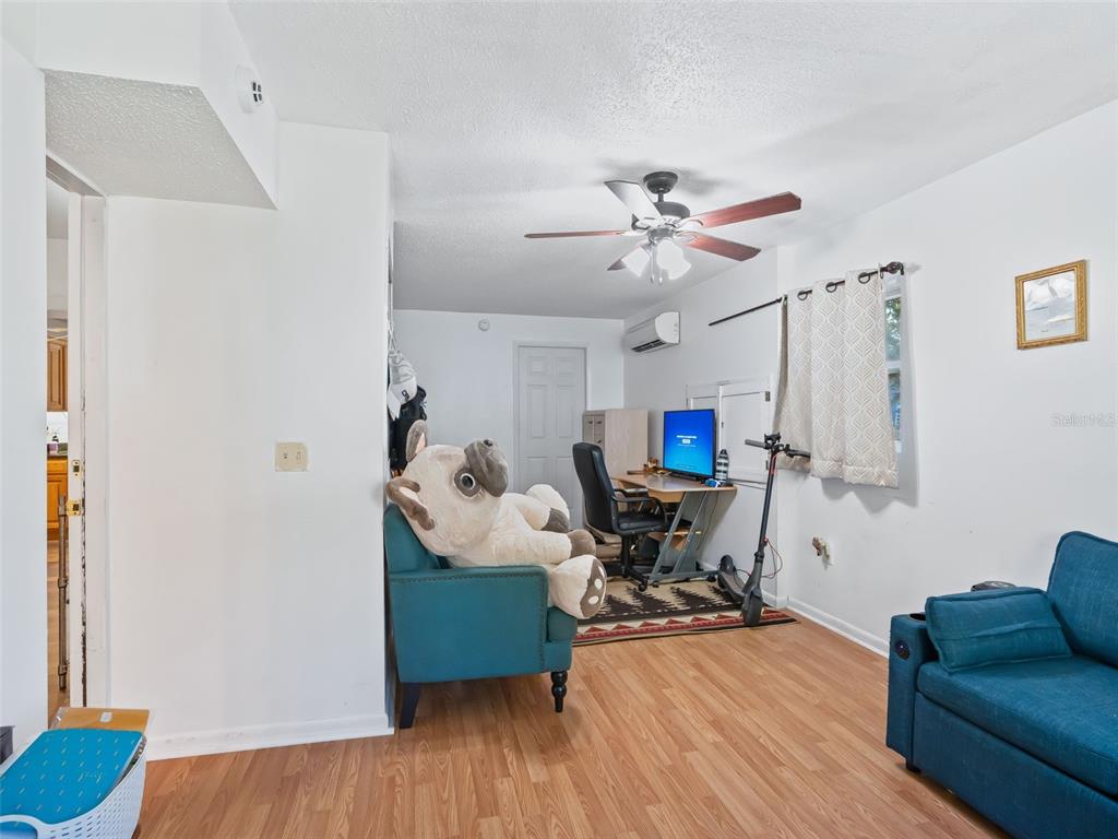 6046 East Loring Lane Inverness, FL 34452 - Photo 38 of 46 a living room with furniture and a wooden floor