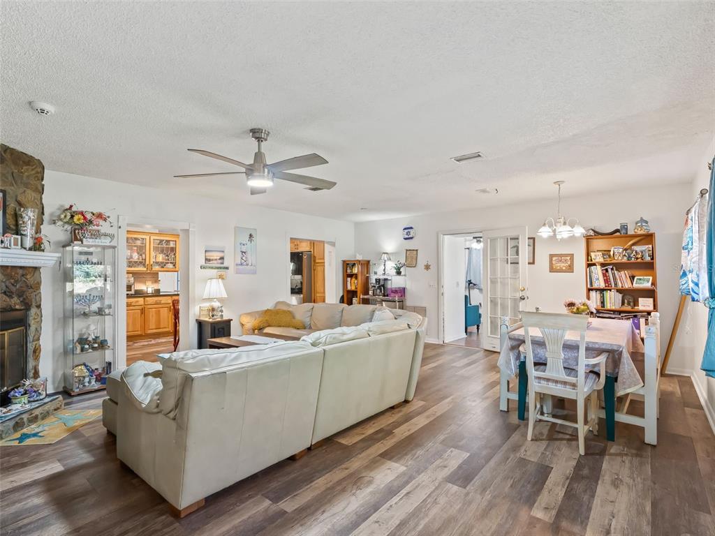6046 East Loring Lane Inverness, FL 34452 - Photo 5 of 46 a living room with furniture and a wooden floor