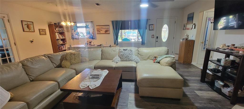 6046 East Loring Lane Inverness, FL 34452 - Photo 6 of 46 a living room with furniture and wooden floor