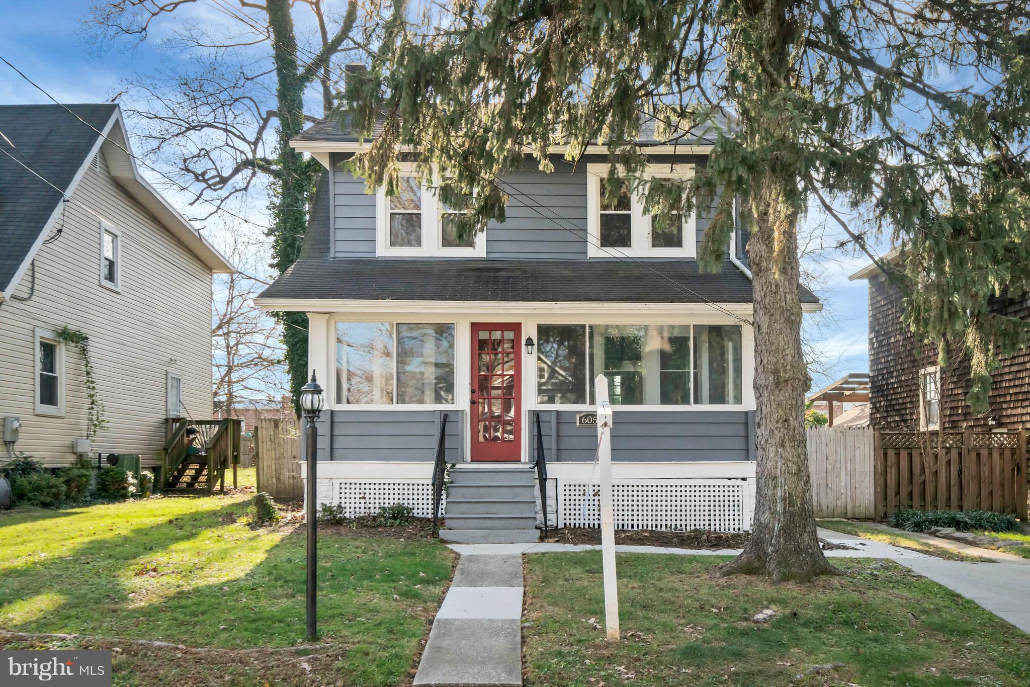 605 St Dunstans Road Baltimore, MD 21212 - Photo 1 of 43 a front view of a house with a yard