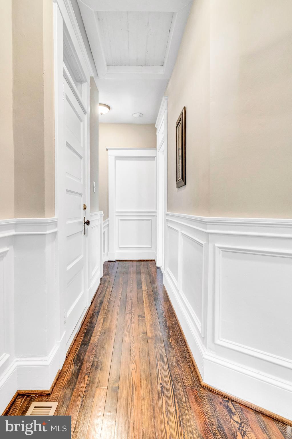 605 St Dunstans Road Baltimore, MD 21212 - Photo 17 of 43 a view of walk in closet with wooden floor