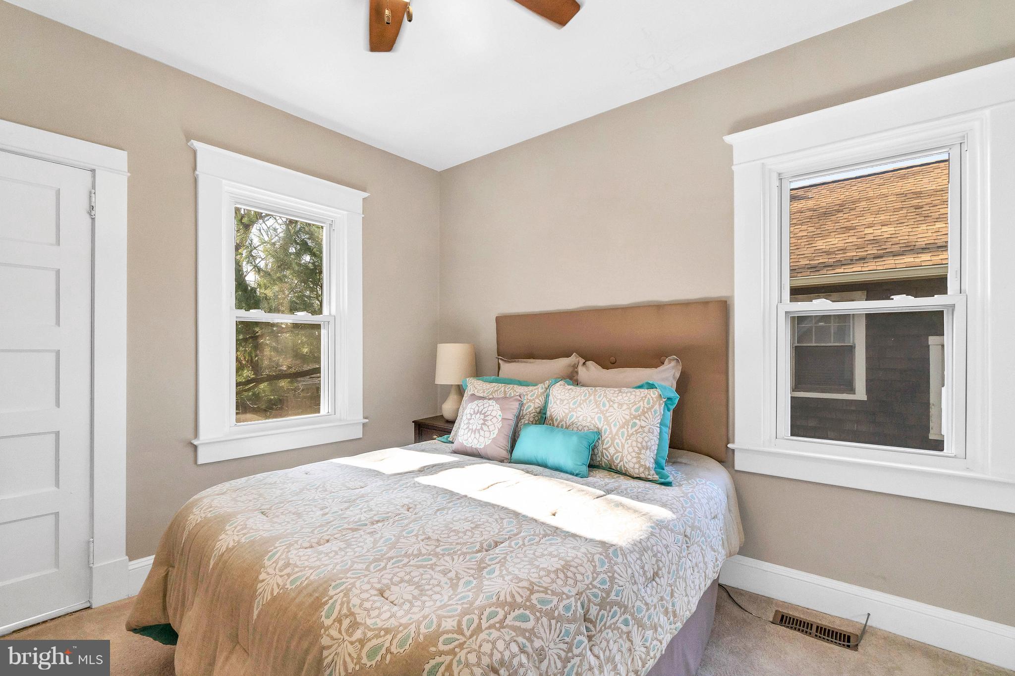 605 St Dunstans Road Baltimore, MD 21212 - Photo 20 of 43 a bedroom with a bed and window