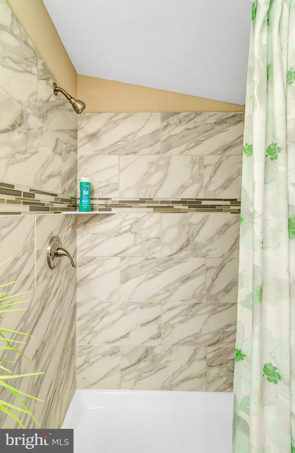605 St Dunstans Road Baltimore, MD 21212 - Photo 25 of 43 a bathroom with a shower