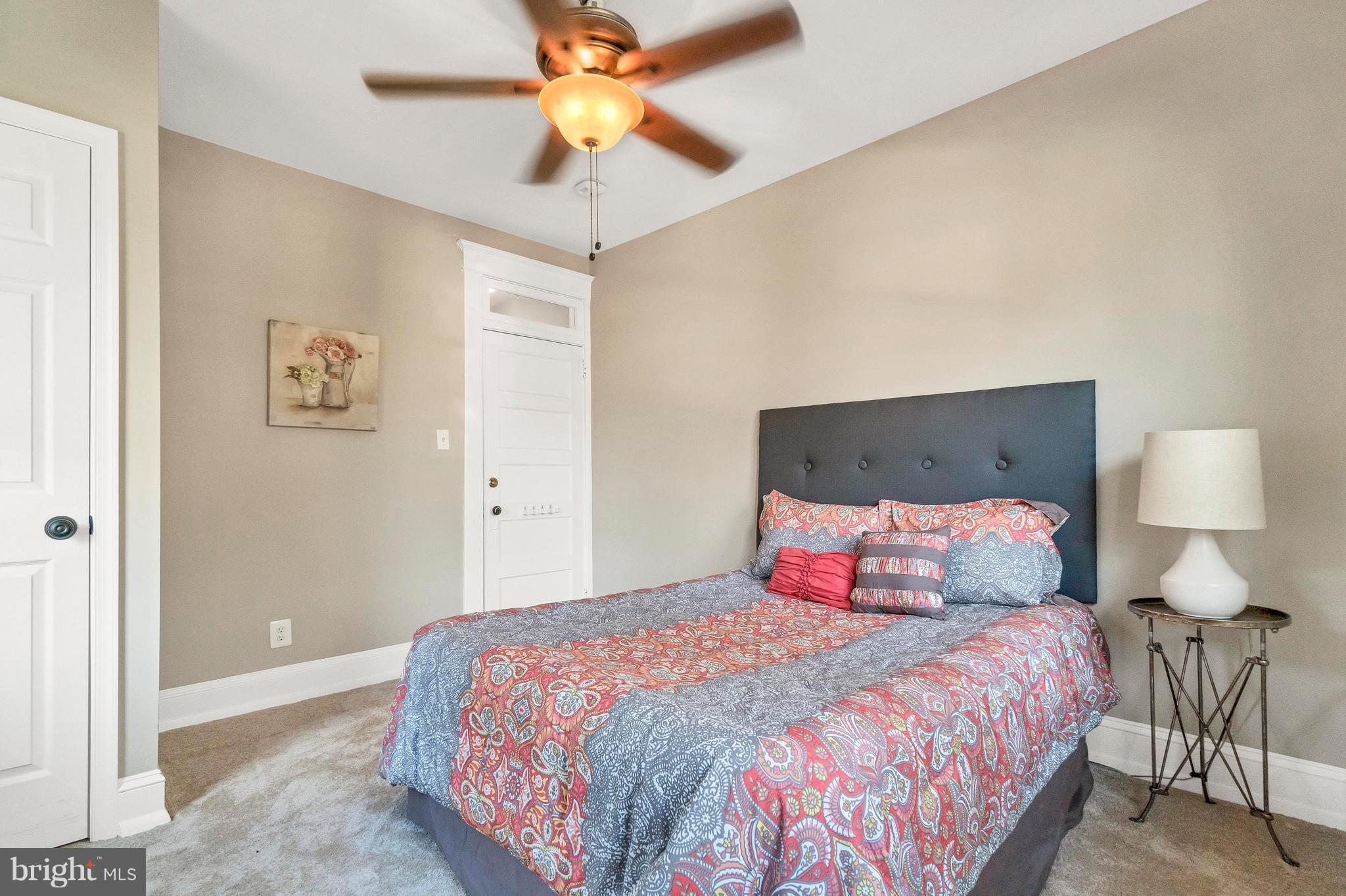 605 St Dunstans Road Baltimore, MD 21212 - Photo 28 of 43 a bedroom with a bed and a ceiling fan